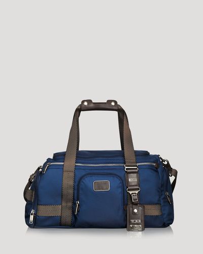 tumi blue bag