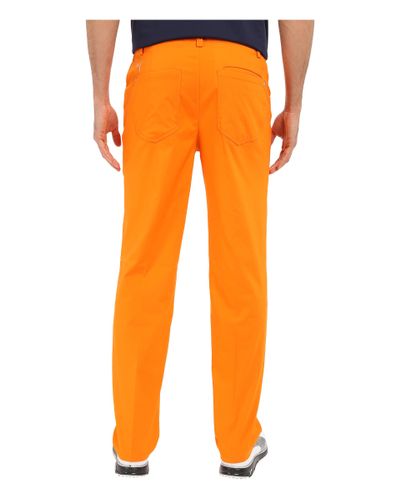 PUMA Synthetic 6-pocket Pants in Orange for Men - Lyst