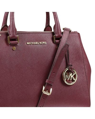 Michael kors wine purse sales