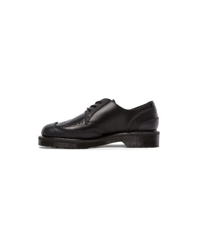 dr martens kelvin brogues in black polished smooth