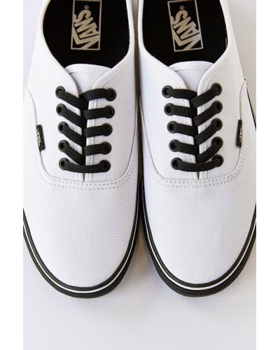 white vans with black bottom