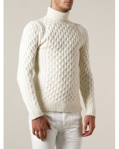 white cable knit turtleneck
