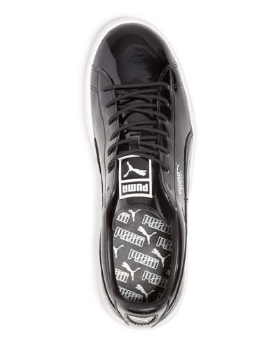 white patent leather pumas