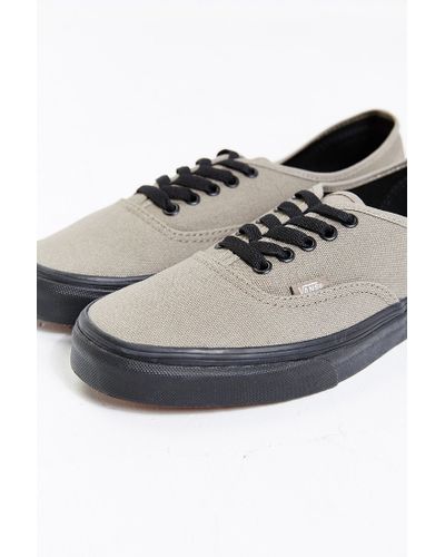 grey vans black sole