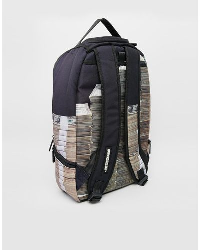 money stacks backpack