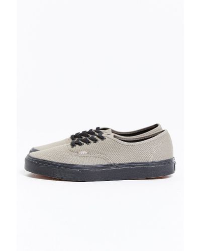 gray vans black sole