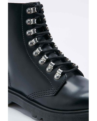 dr martens assange