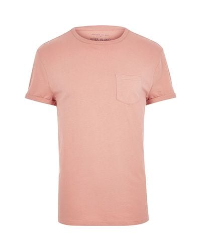 salmon color shirt
