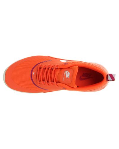 orange nike thea