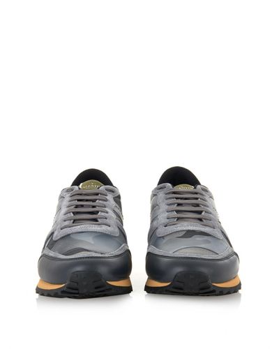white and grey valentino trainers