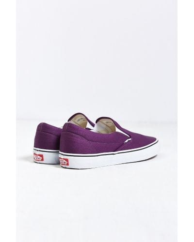 purple and black slip on vans