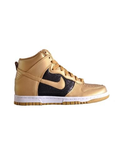 nike dunk high black and gold