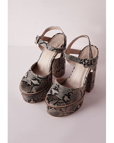 Snakeskin platform heels Clearance