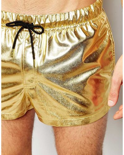 gold shiny shorts