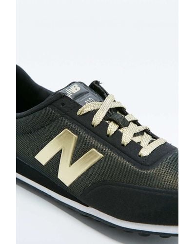 New Balance 410 Black And Gold Trainers for Men - Lyst