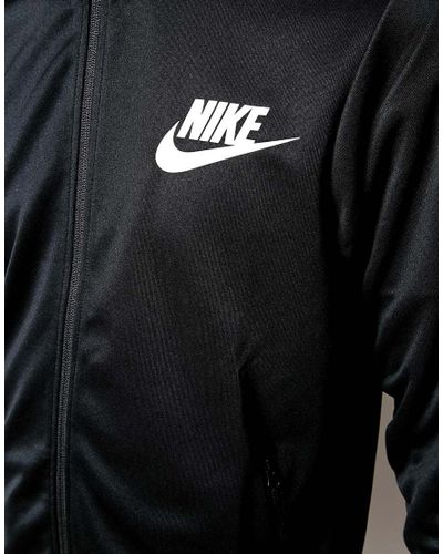nike limitless track top
