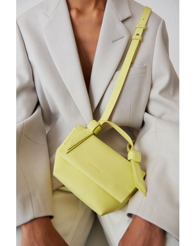 pale yellow handbag