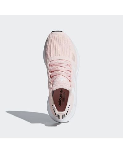 pink adidas swift run