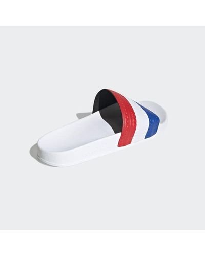 adidas Rubber Adilette Slides in Red - Lyst