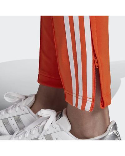 orange sst tracksuit