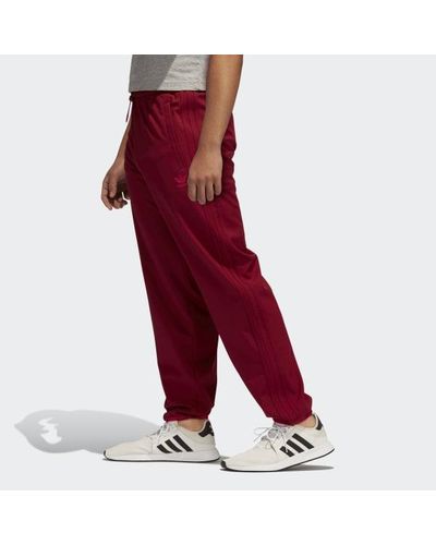 adidas Synthetic Winterized Track Pants in Burgundy (Red) for Men - Lyst