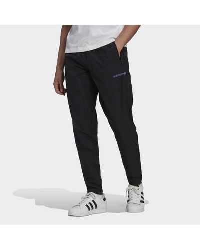 adidas Adaptive Wind Pants in Black for Men | Lyst