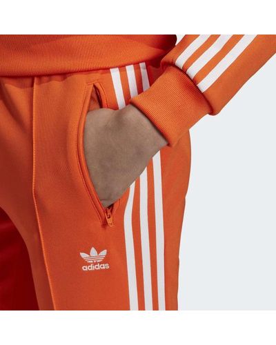orange sst tracksuit