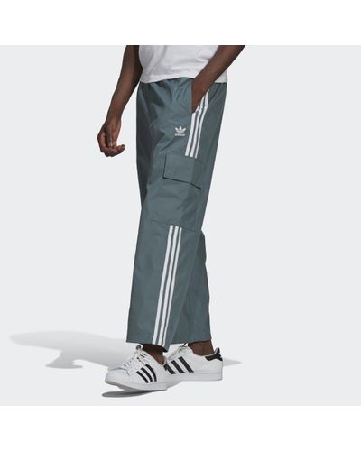 Pantalón Adicolor Classics Cargo 3 bandas adidas de Tejido sintético de  color Verde para hombre | Lyst
