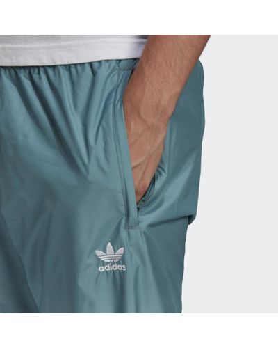 Track pants adicolor 3D Trefoil 3-Stripes Ombréadidas in Materiale  sintetico da Uomo colore Bianco | Lyst