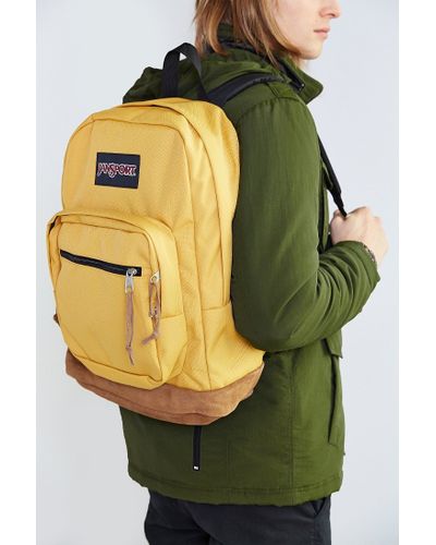 light yellow jansport backpack