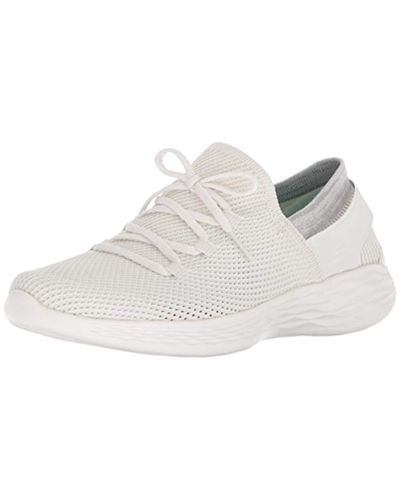 white skechers slip on trainers