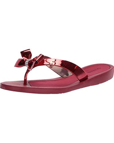 red guess flip flops