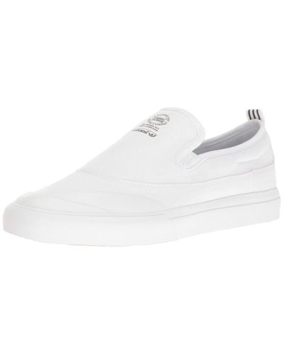 White matchcourt slip ons Clearance