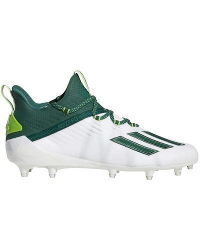 green and white adidas football cleats