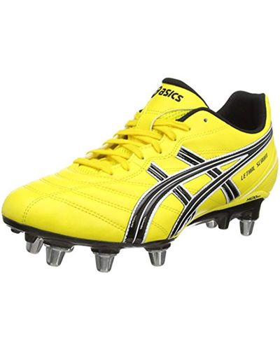 yellow asics boots