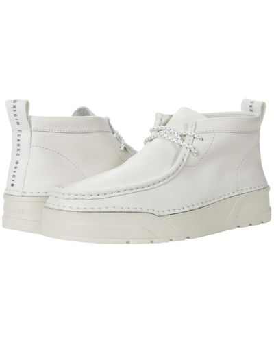 white leather wallabees