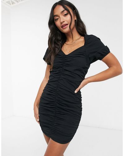 Vestido negro con frunces Stradivarius de color Negro | Lyst