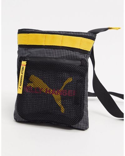 puma x helly hansen bolsa