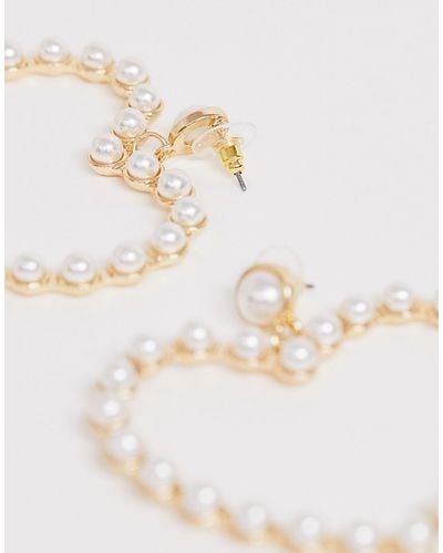 skygge deltager effektiv ALDO Synthetic Pearl Trim Heart Earrings in White - Lyst