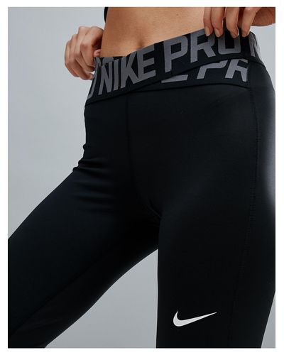 Nike Pro Training Cross Over Legging In Black - Lyst