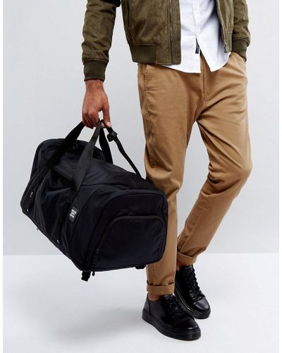 large herschel duffle bolsa