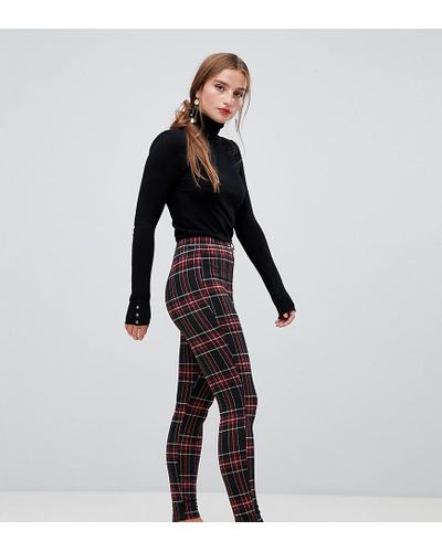 Leggings a quadri rossiStradivarius in Denim di colore Nero | Lyst