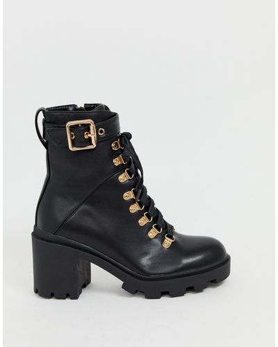 black boots gold hardware