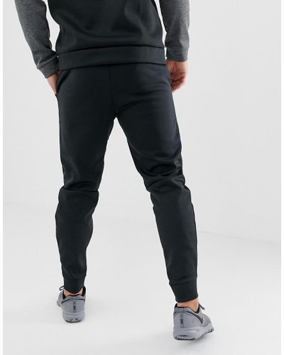 nike thermal track pants
