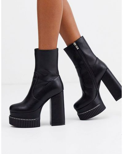 lamoda knee high chunky heel boots in black
