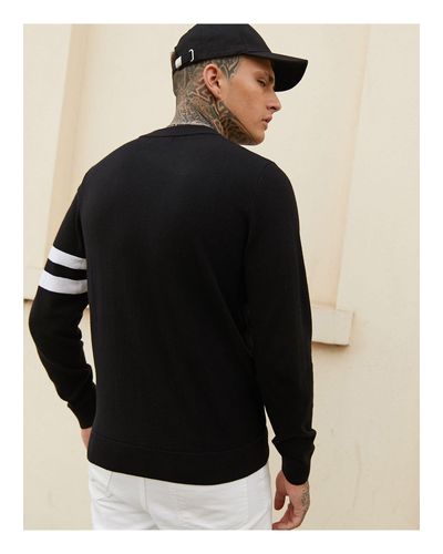 jumper with stripe down arm