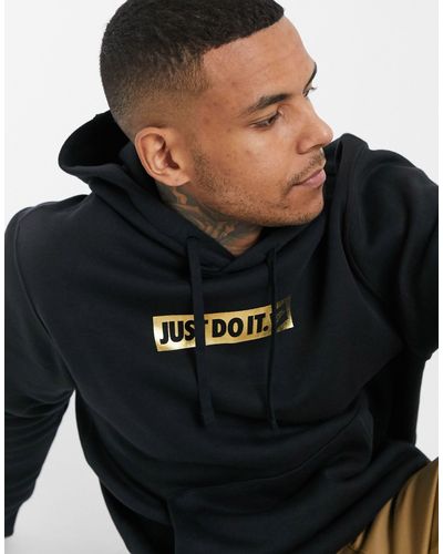 SUDADERA NIKE SPORTSWEAR JUST DO IT negra | AW LAB