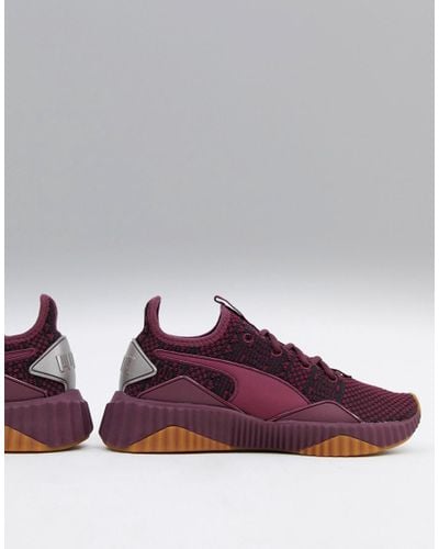 puma red trainers womens