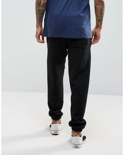 Carhartt WIP Cotton Chase Joggers in Black for Men - Lyst