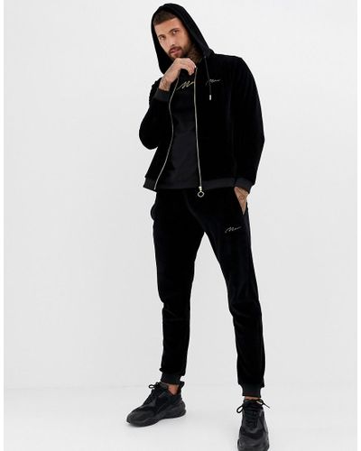 Tuta in velour nera con ricami oroBoohooMAN in Denim da Uomo colore Nero |  Lyst